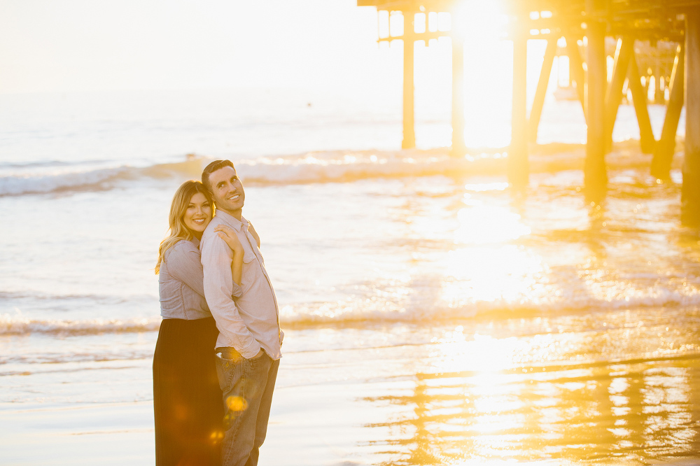 Nikki and Derrick at the beach at sunset. 