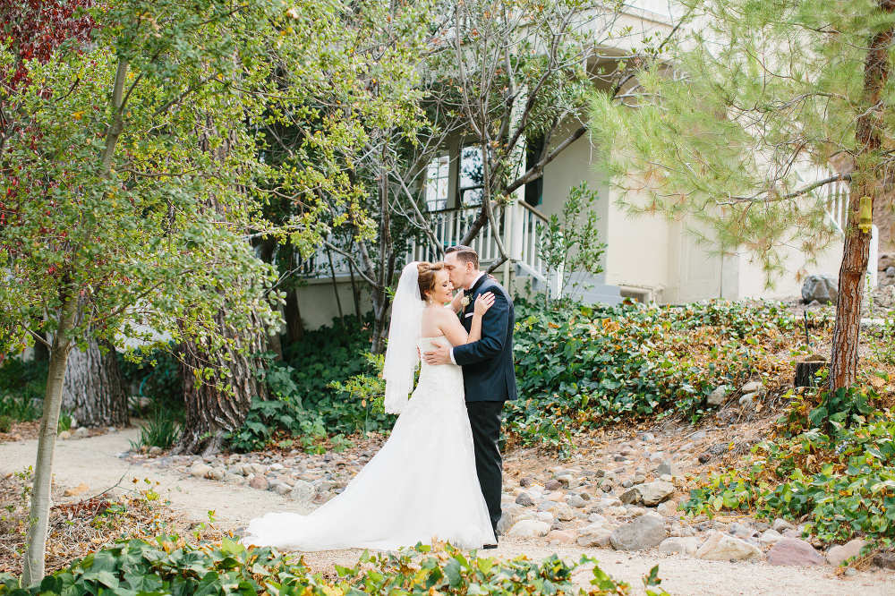 A sweet portrait of the groom kissing Sarah-Jane