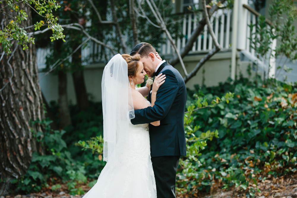 A sweet photo of the bride and groom holding each other. 