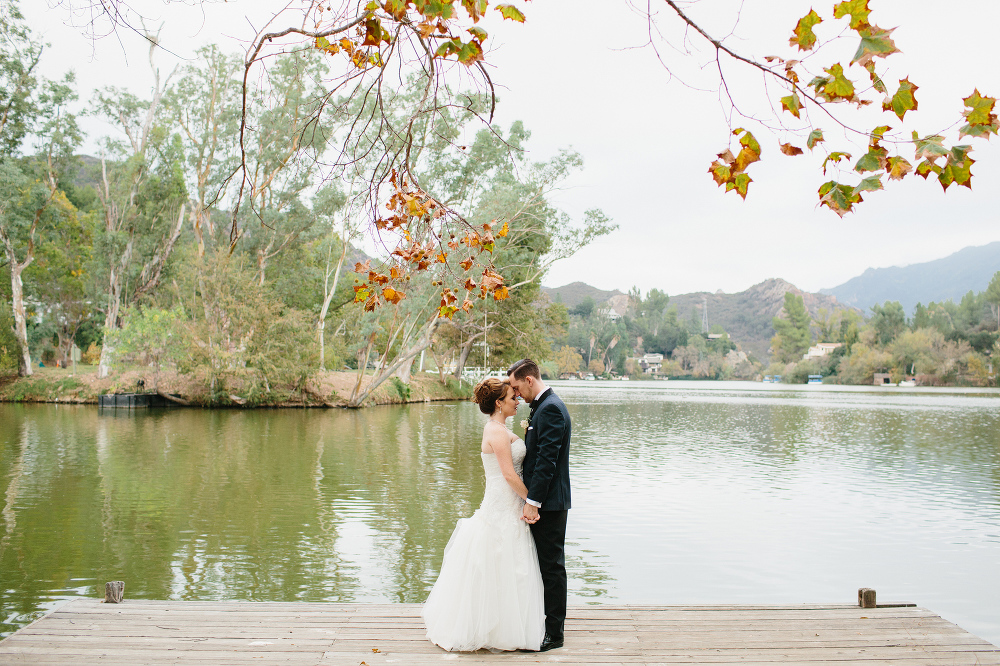Bride and groom portraits at the lake. 