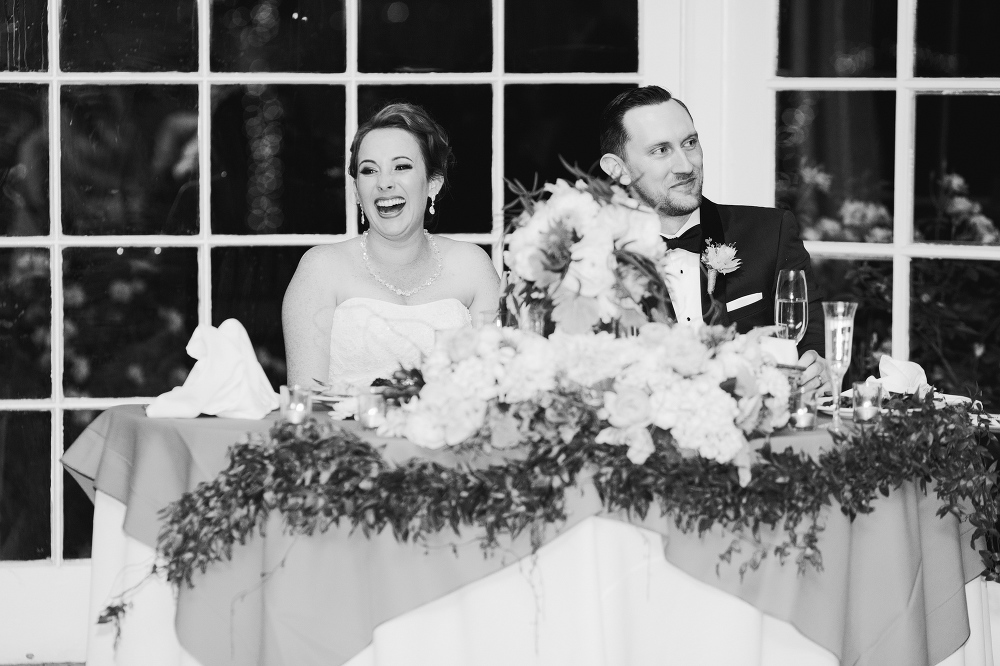 A cute photo of Sarah-Jane laughing during toasts. 