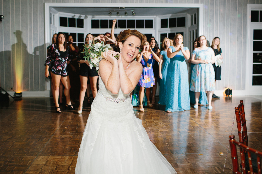 A cute photo of Sarah-Jane tossing the bouquet. 
