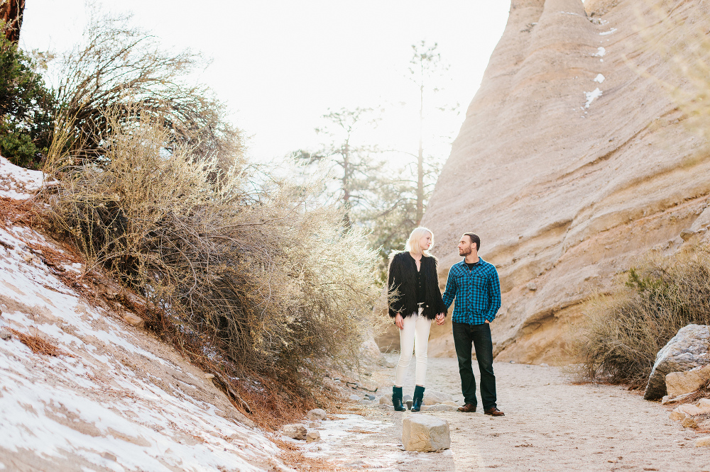 The couple on a dirt path. 