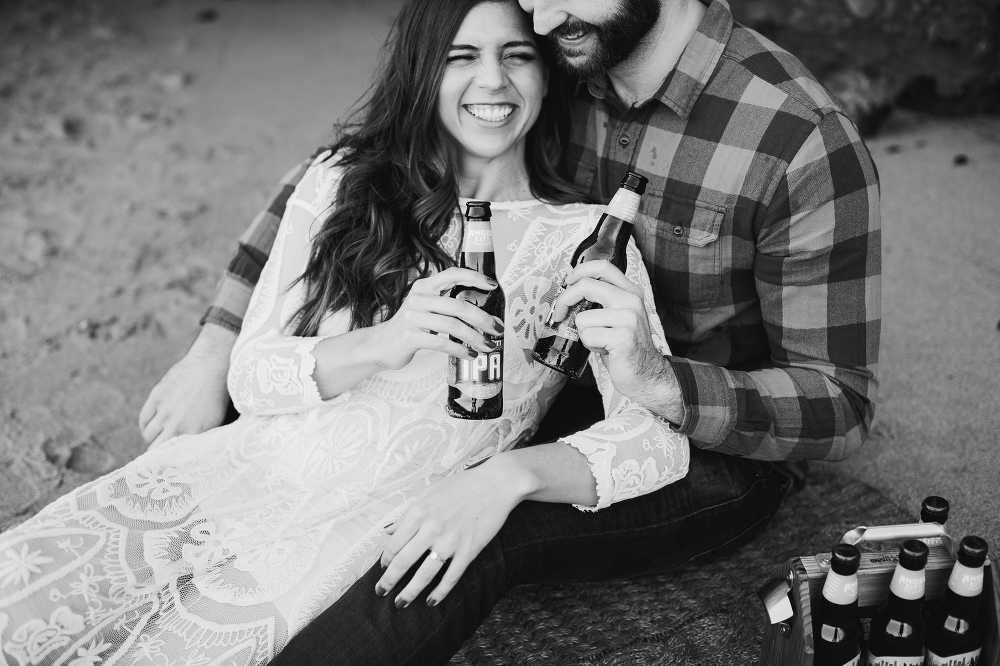 Desi and Curtis having beers at the beach. 