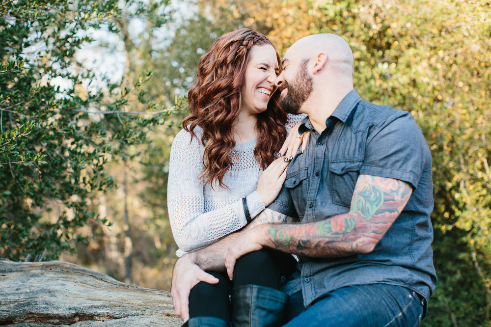 An adorable photo of the couple laughing. 