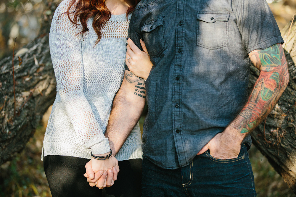 Shara and Steven holding hands. 