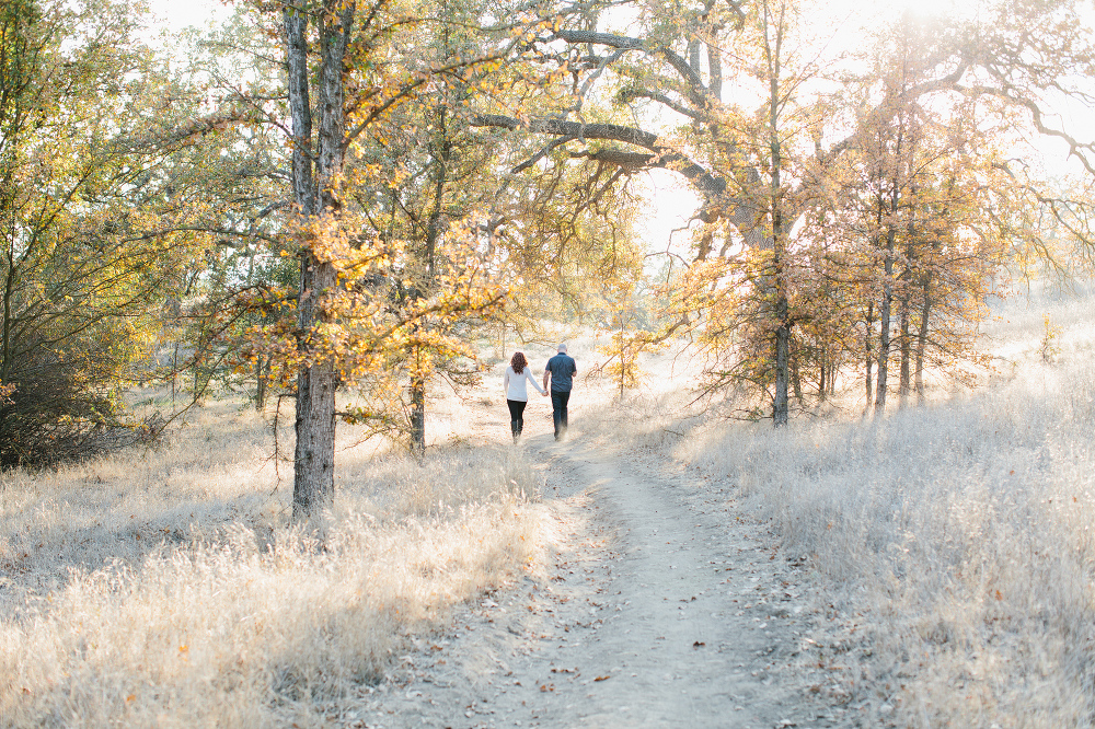 Shara and Steven walking together in the park. 