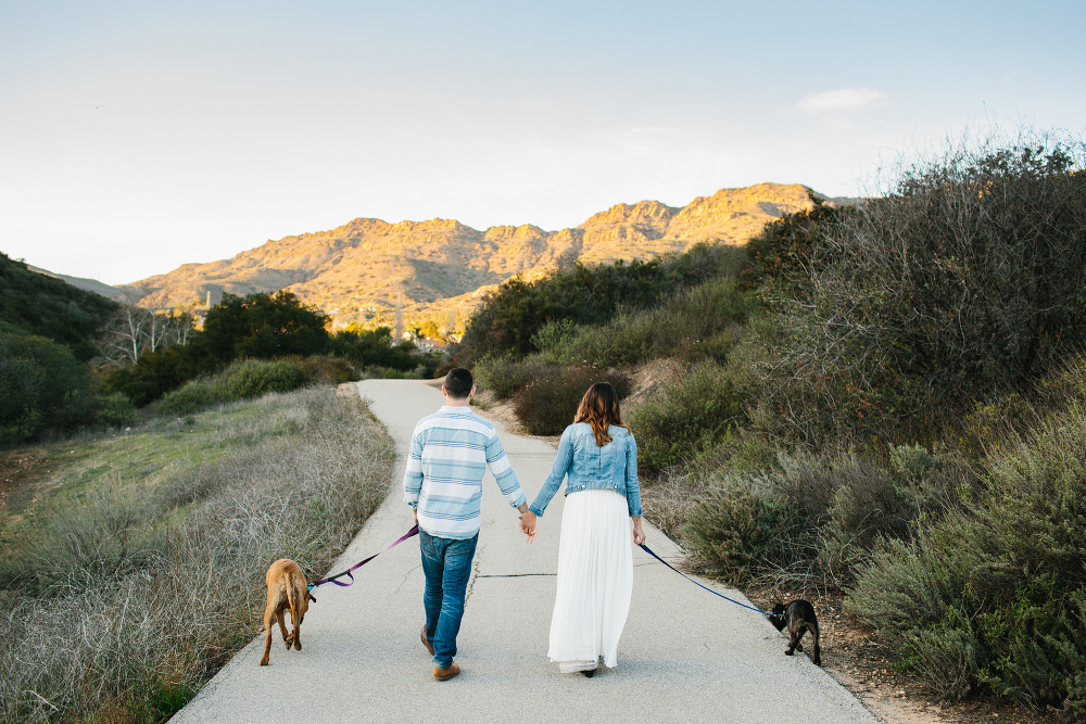 Kailie and Michael walking their puppies. 