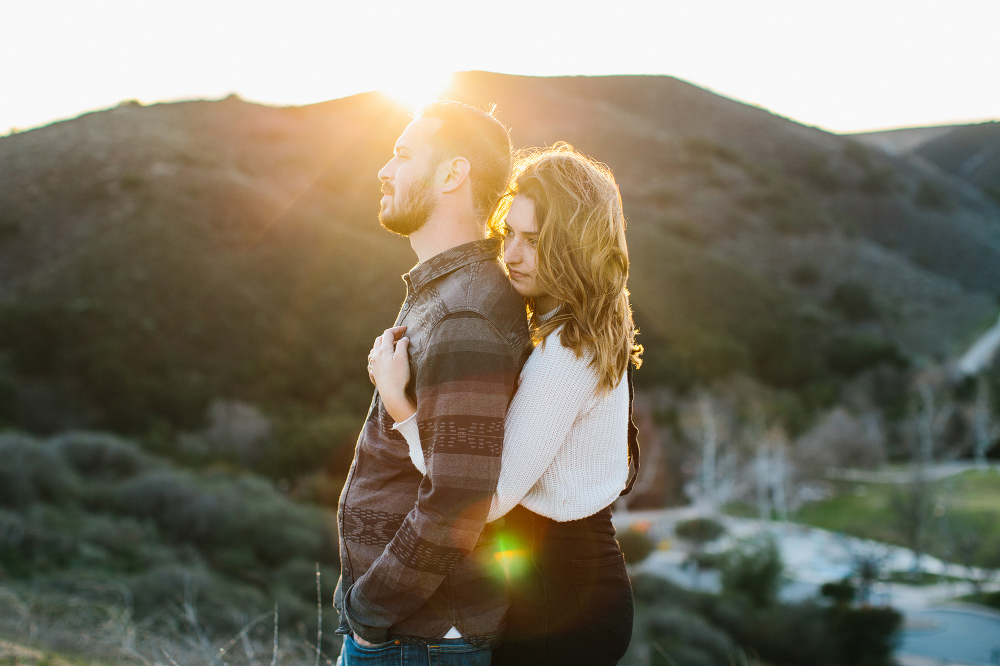 Beautiful sunflare in a photo of the couple. 