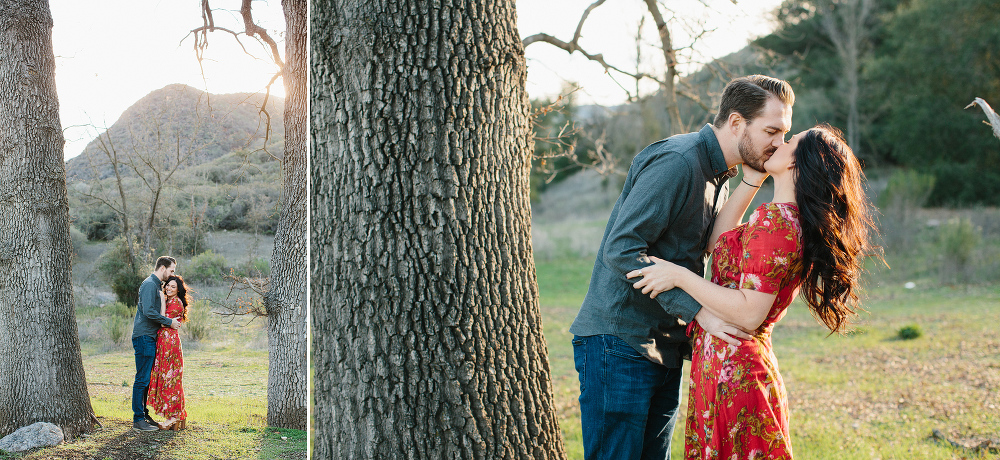 The couple between two large trees. 