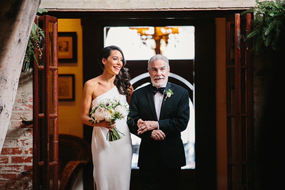 Mary walking into the ceremony with her father. 