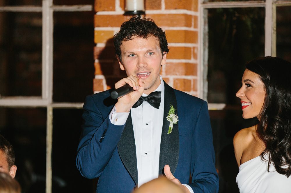 The groom giving a welcome toast. 