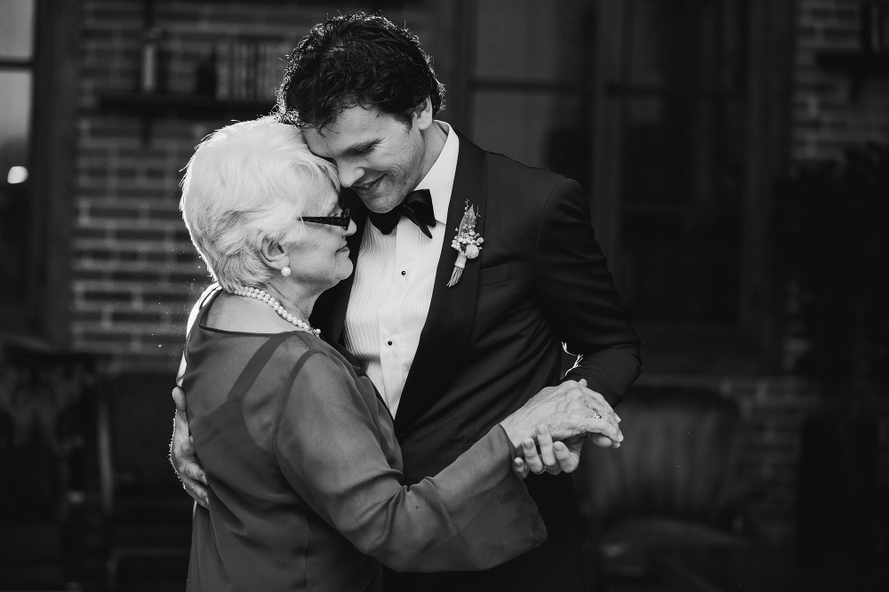 A sweet moment between the groom and his mom. 