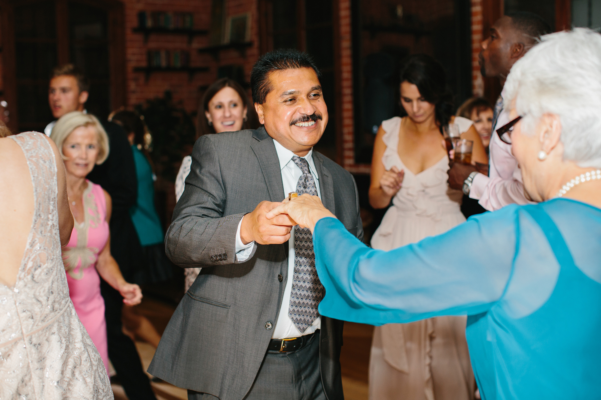 The groom's mother dancing. 