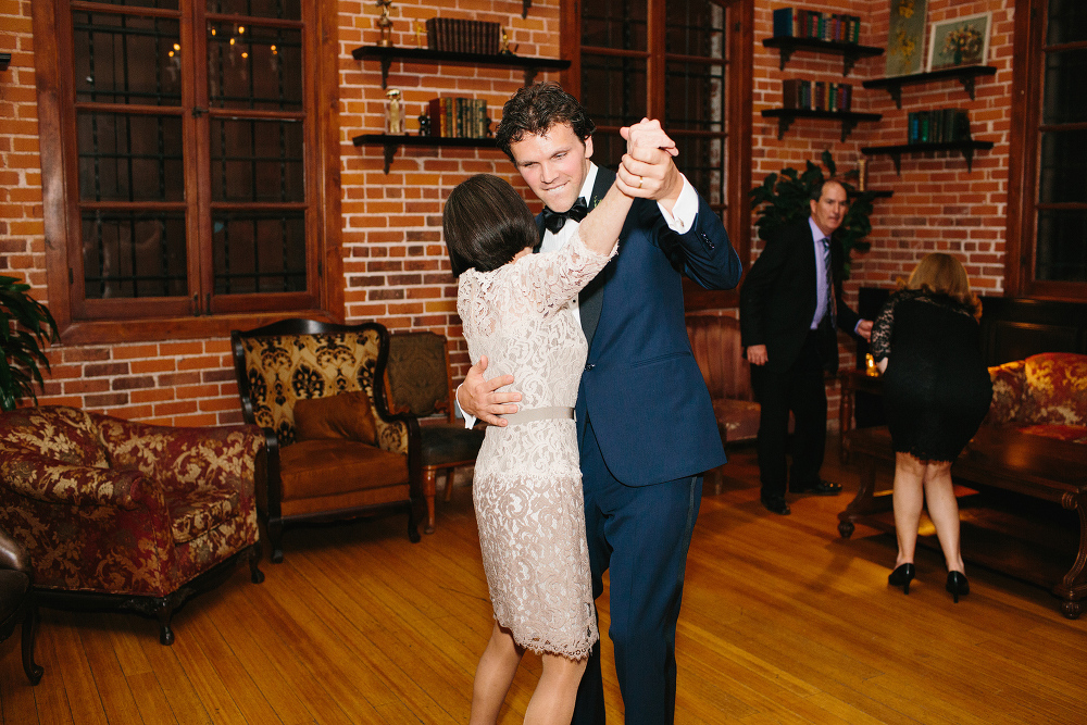 The groom dancing with a guest. 