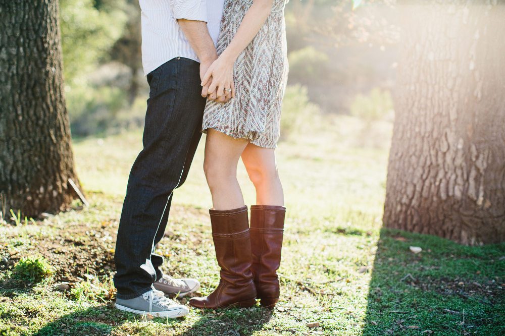 The couple holding hands. 