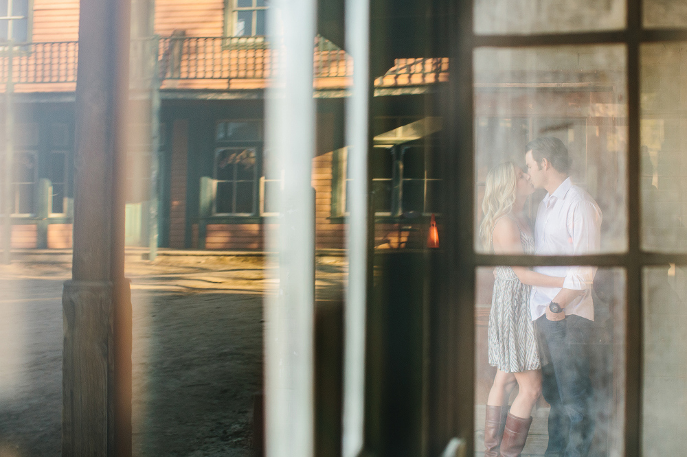 A photo of the couple through the window. 