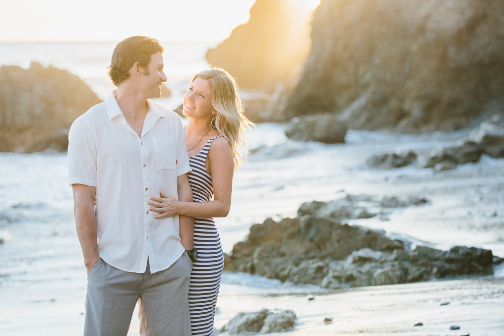 The couple smiling at each other. 