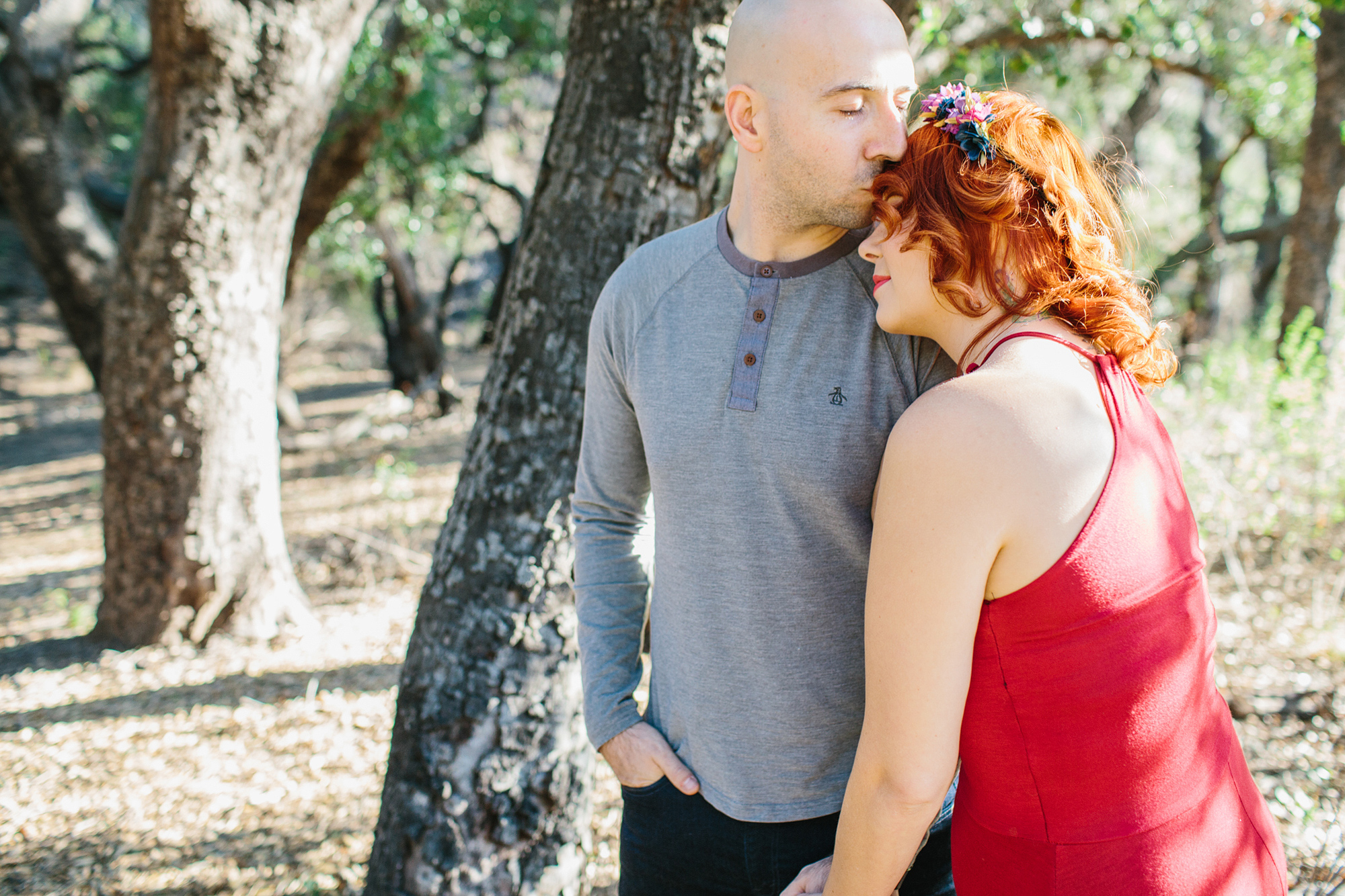 The couple by trees. 