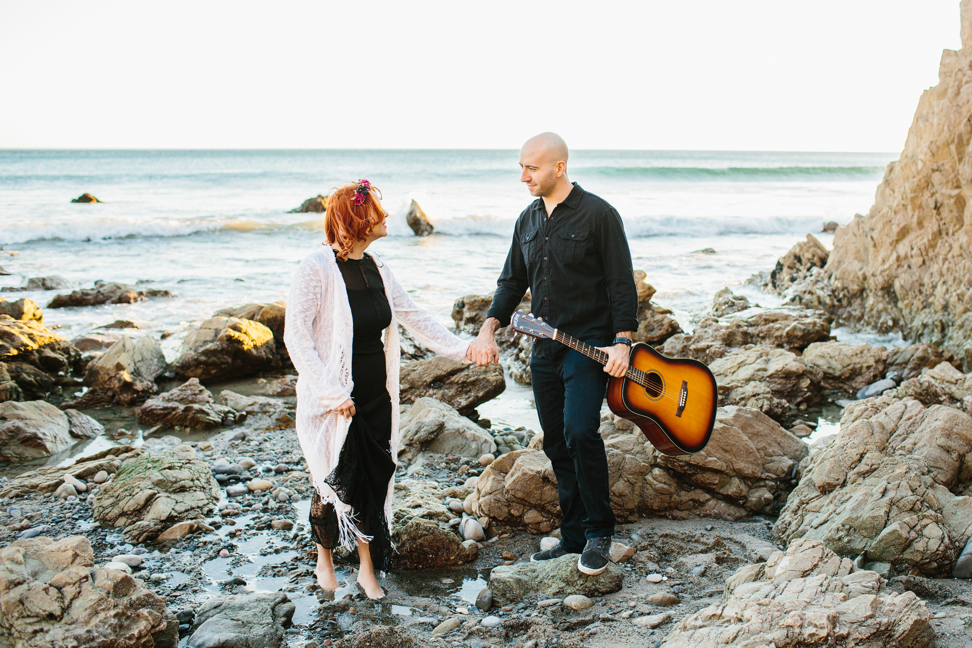 The couple playing in the water. 