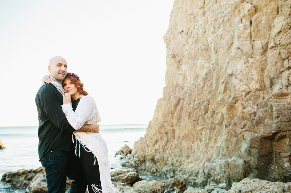 The couple at a cove beach. 