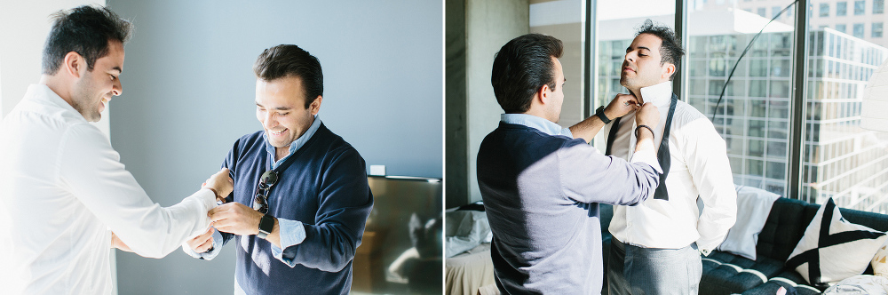 The groom getting dressed. 