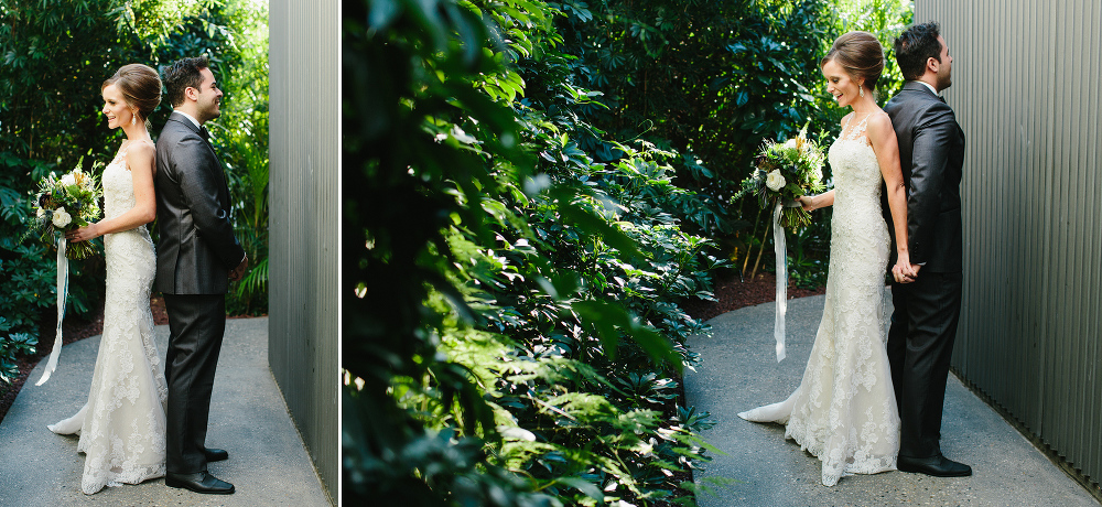 The bride and groom back to back. 