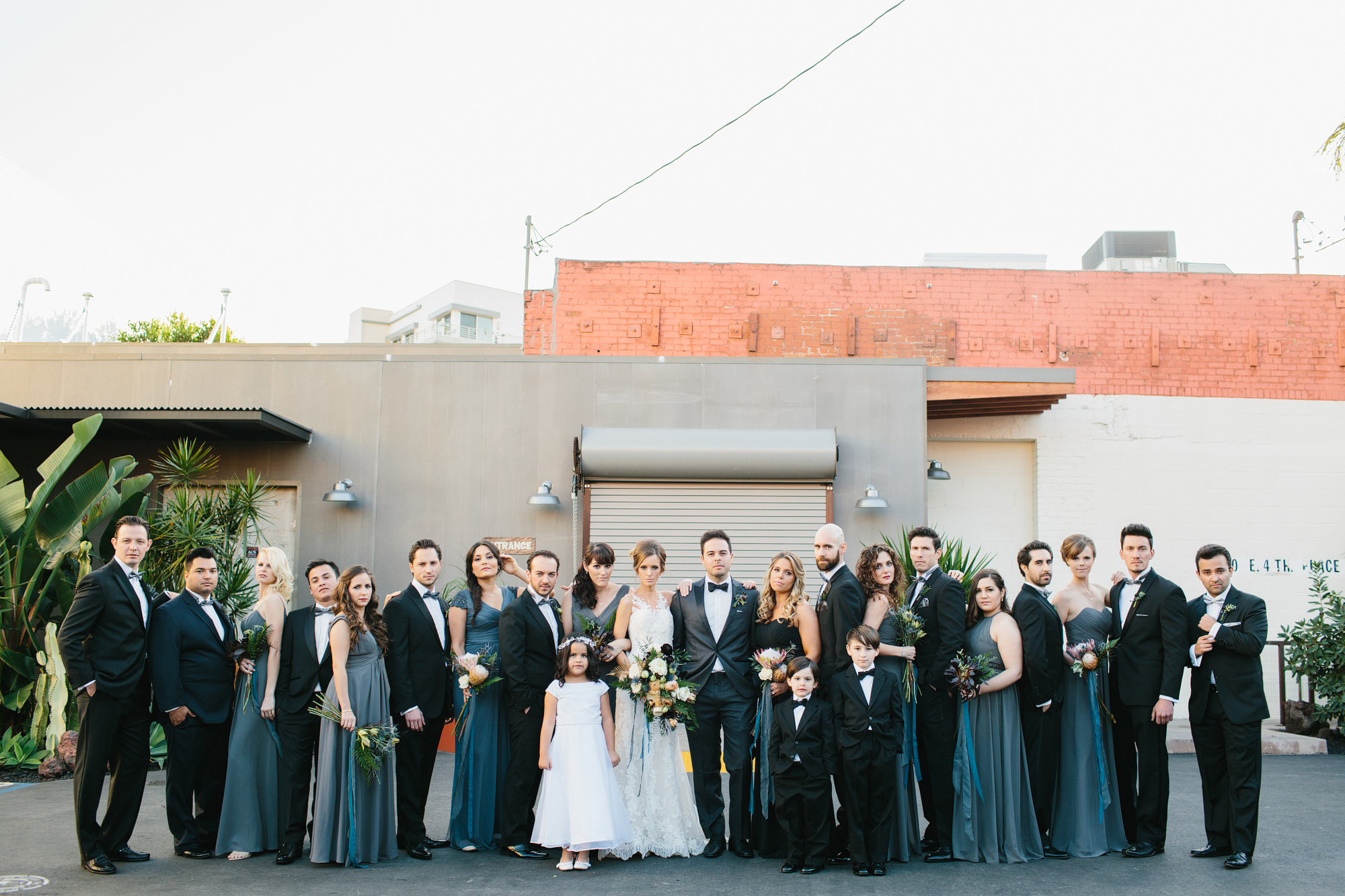 The full wedding party outside the Millwick. 