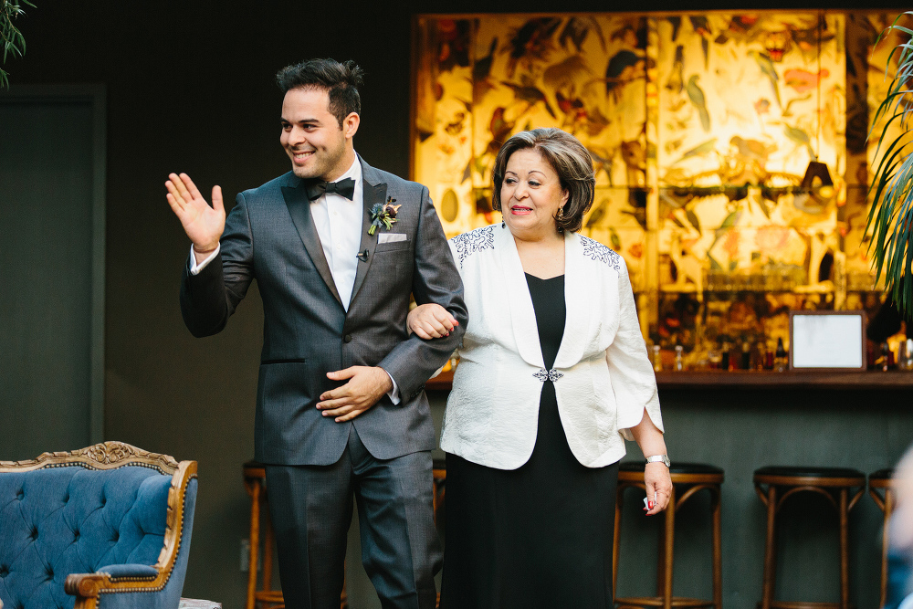 Luis walking down the aisle. 