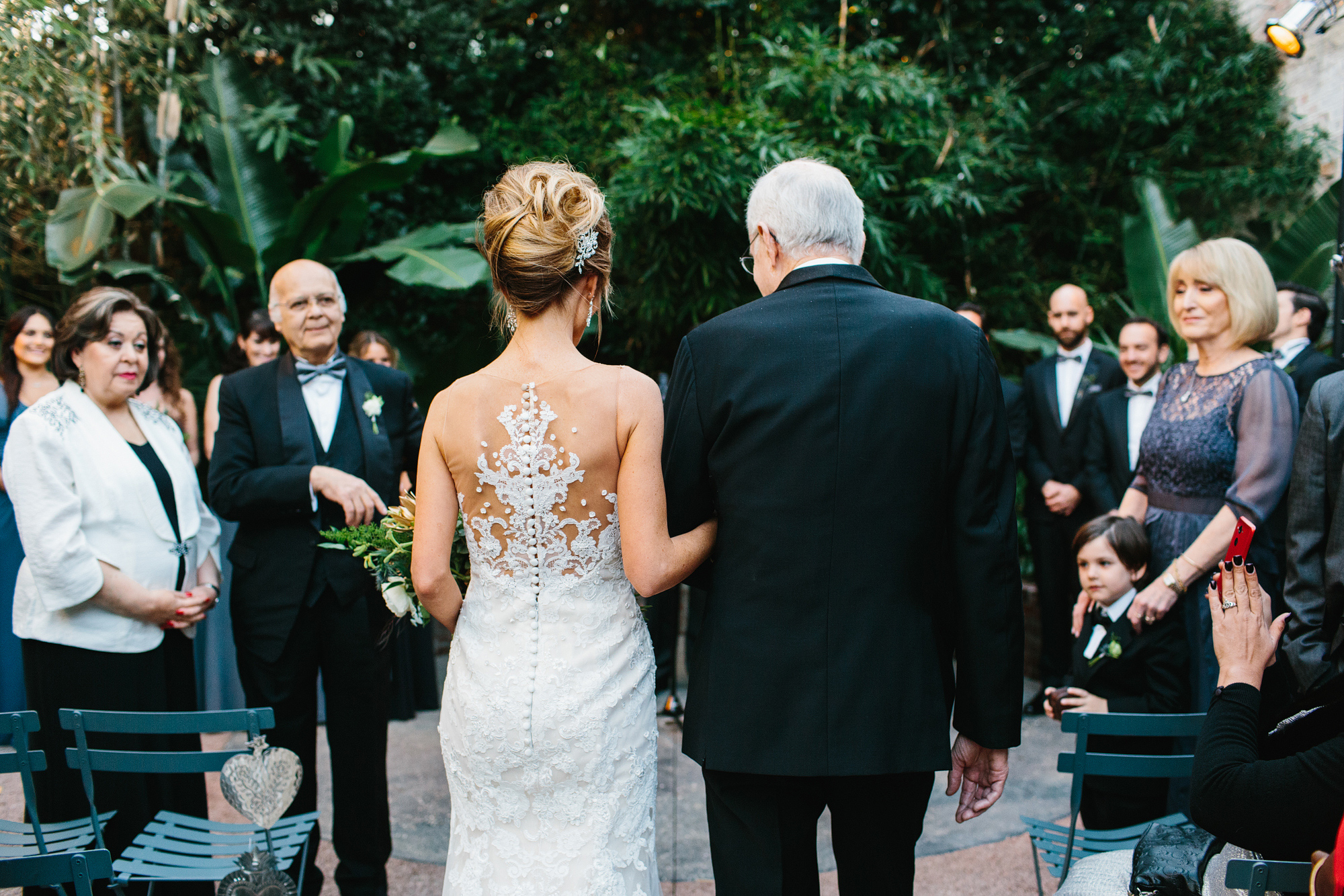 The bride's father giving her away. 