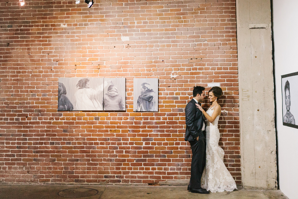 Ashley and Luis in an art gallery. 