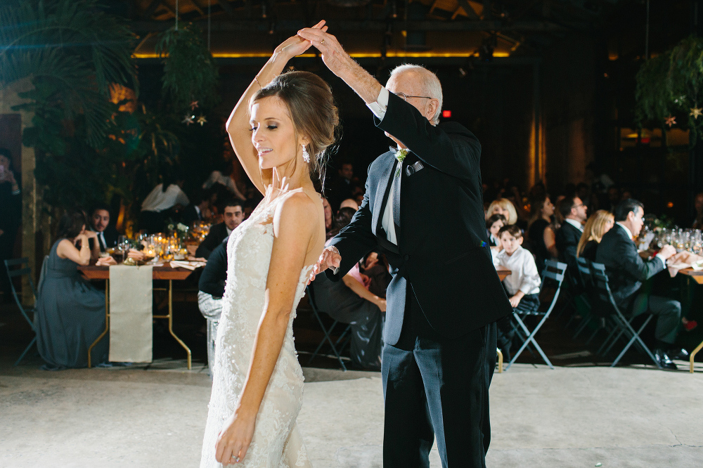 The bride dancing with her dad. 