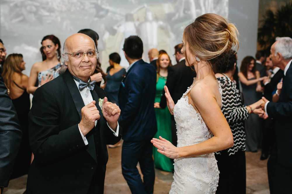 The father of the groom and bride together. 