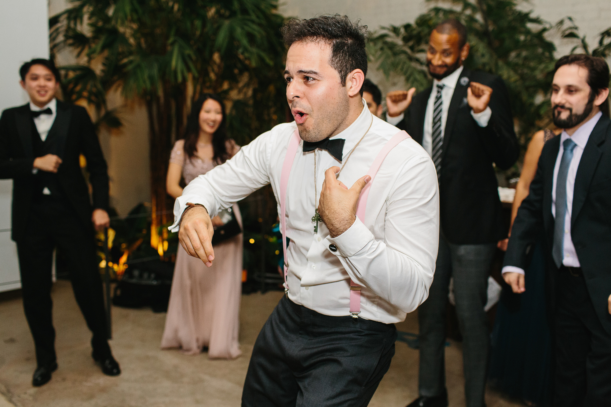 The groom dancing for his guests. 