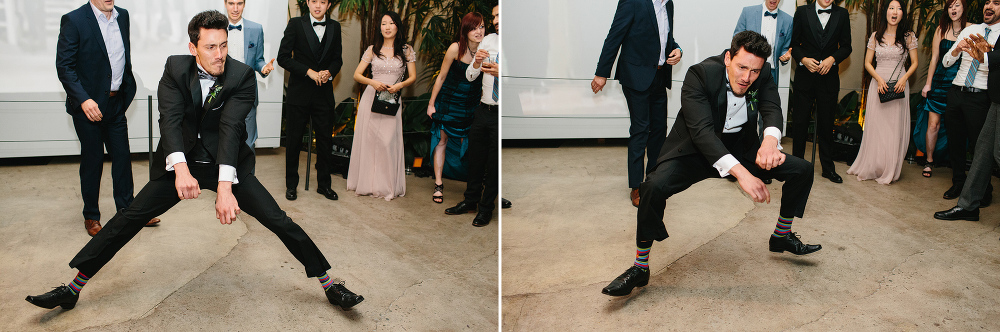 A groomsmen break dancing. 