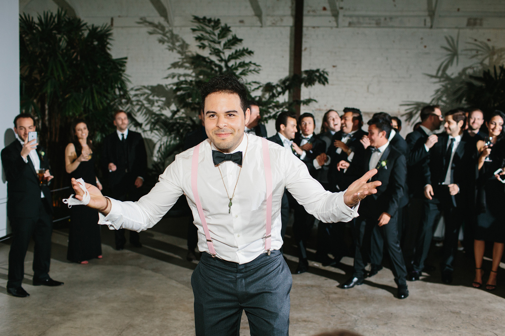 The groom tossing the garter. 