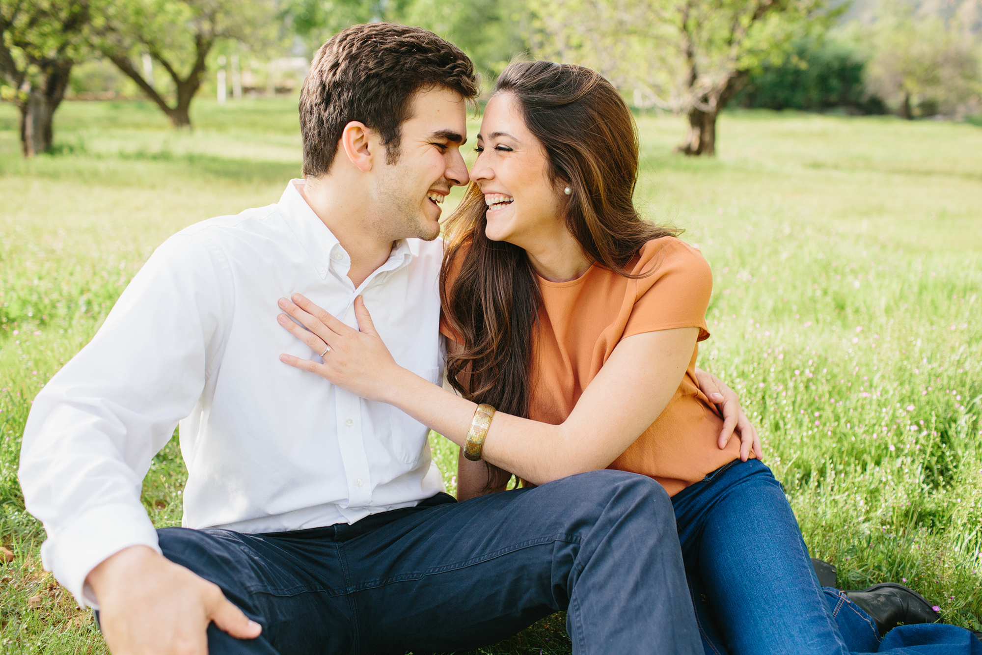 The couple laughing. 