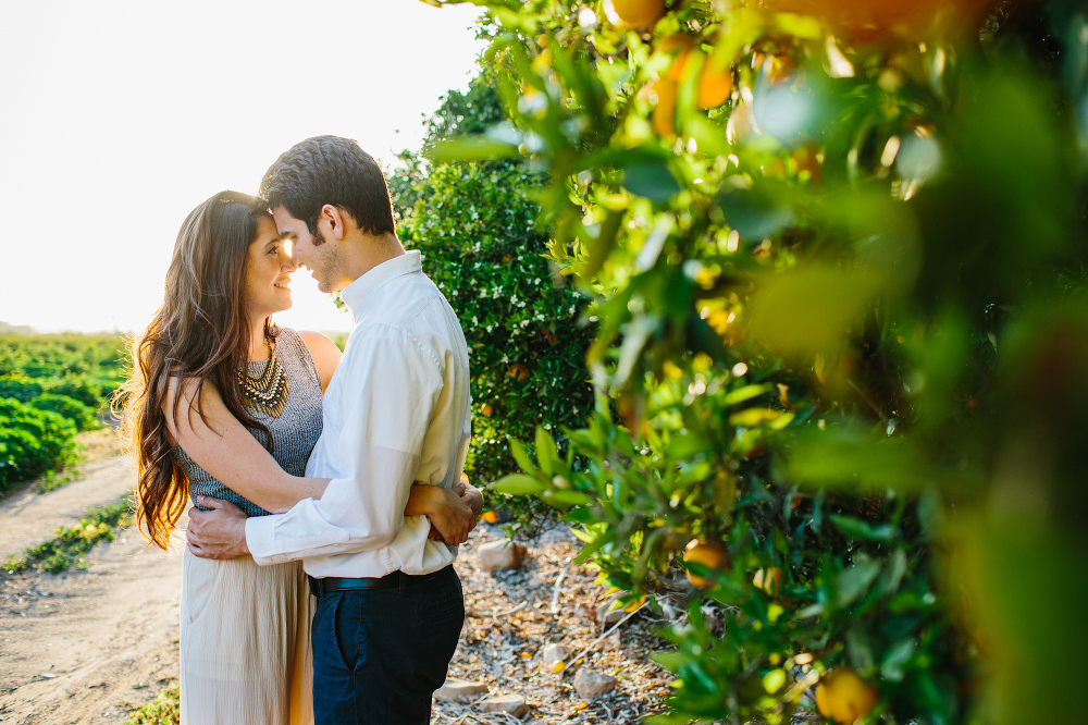 Rosario and Charlie in an orchard. 